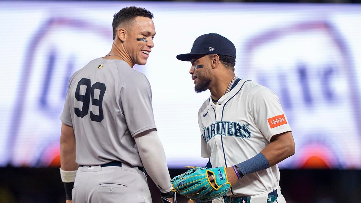 Aaron Judge and Julio Rodriguez interact