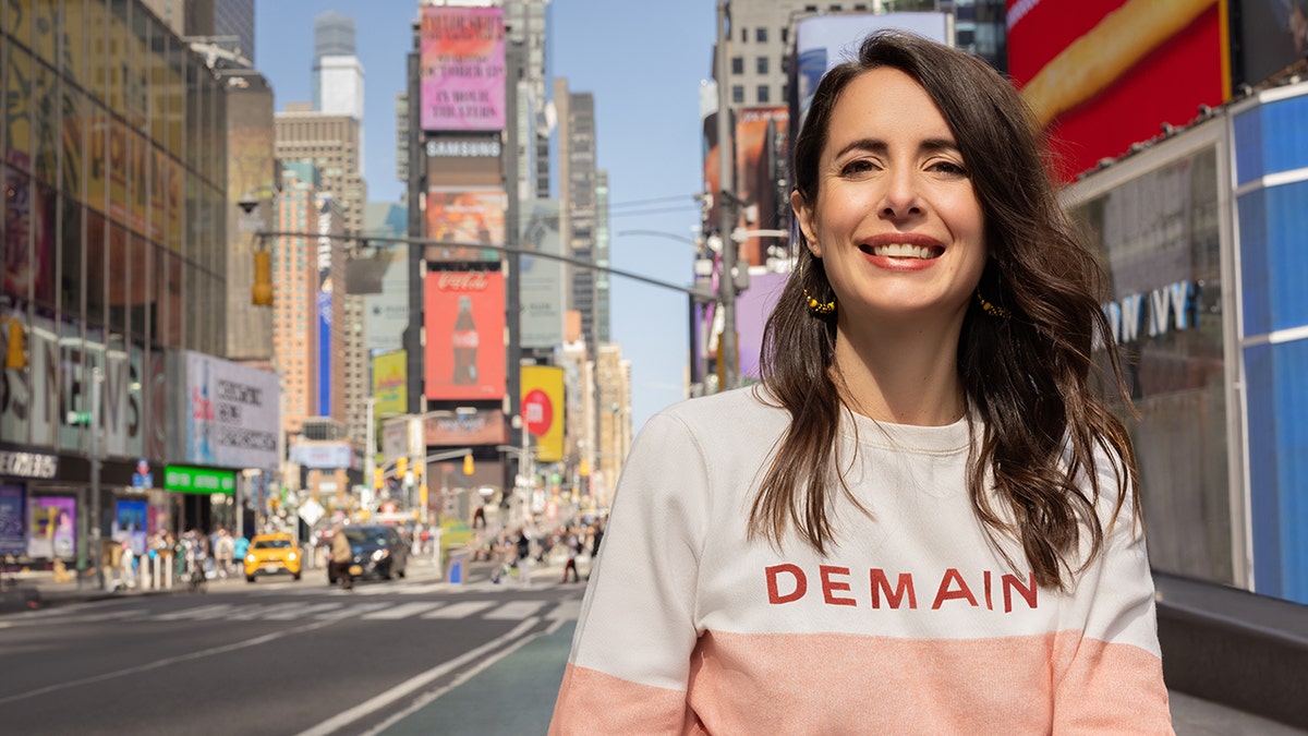 Julie March, Yuka co -founder, poses for a photograph in Times Square in New York City.