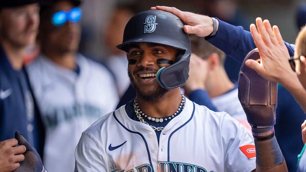 Julio Rodriguez celebrates
