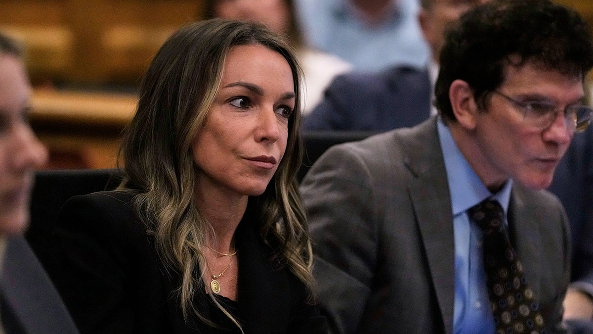Karen read in court to retrial for the death of John Okif.
