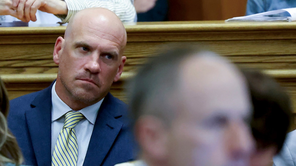 Victim's brother seated in court at the Karen Read retrial.