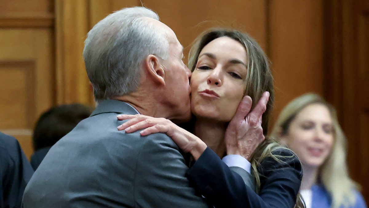 Karen read with her father in court on re -examination.