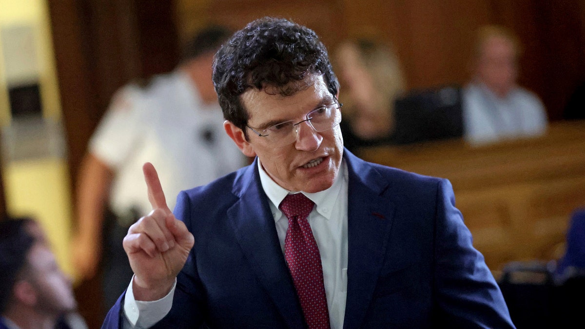 Lawyer Robert Alessi retried in court for Karen reading.