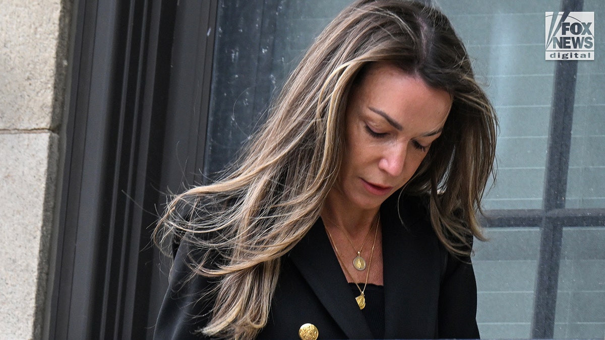 Karen Read walking into the courthouse for her re-trial facing charges for the death of John O'Keefe.