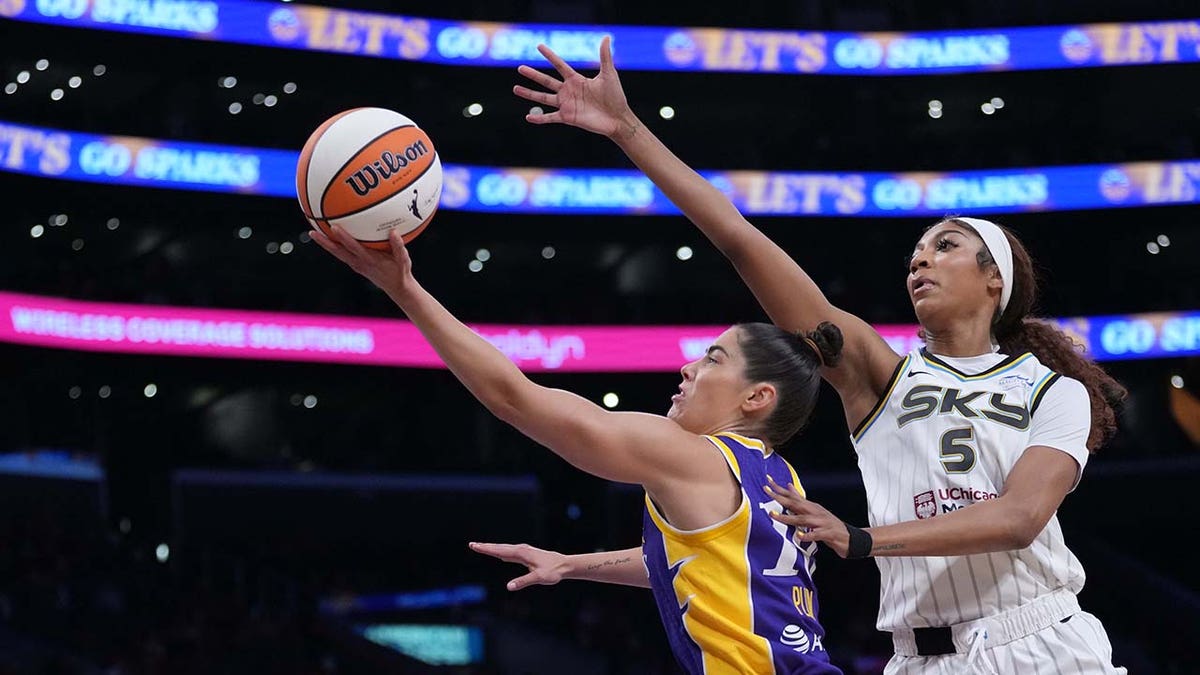 Kelsey Plum drives to the basket