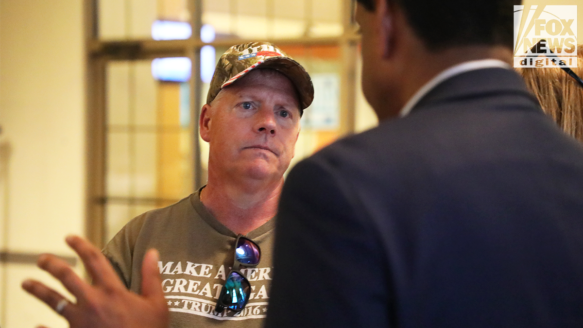 Rep. Ro Khanna tells a Trump supporter about his legislation to codify President Donald Trump's executive order to lower prescription drug prices.