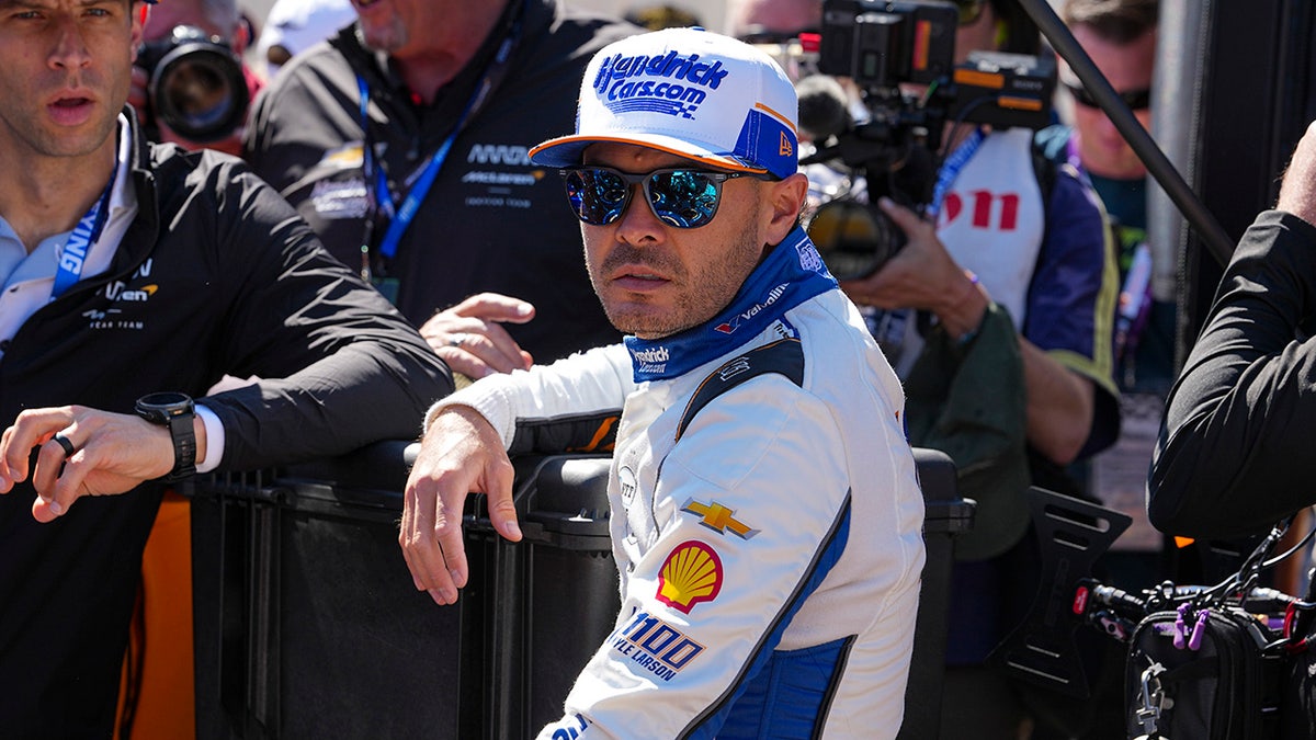Kyle Larson looks on