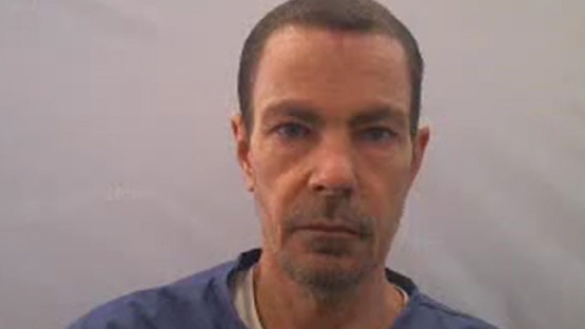 A close-up of Jeremy Scott's mugshot.