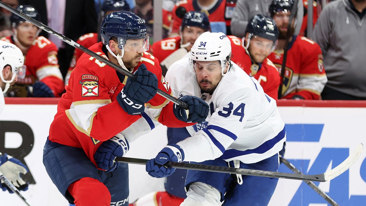 Auston Matthews hitting opponent