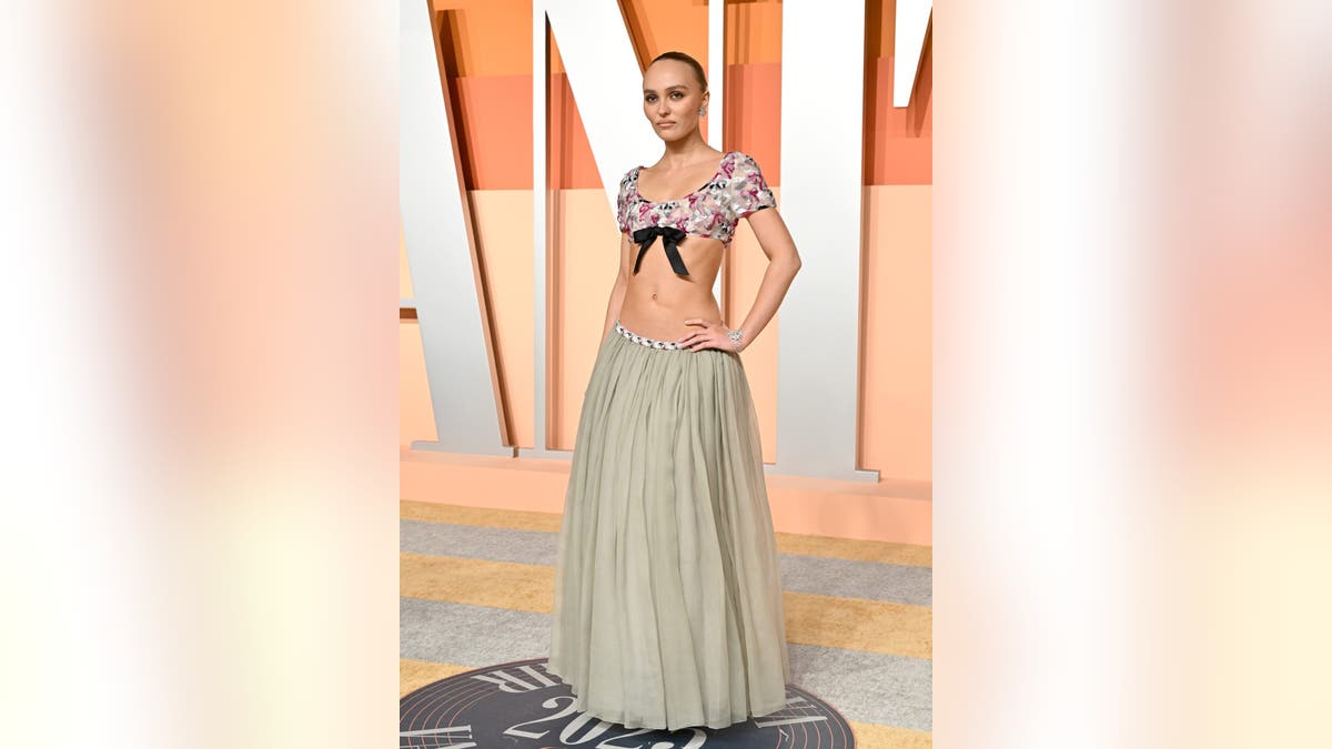 Lili-Rose Depp in a gown