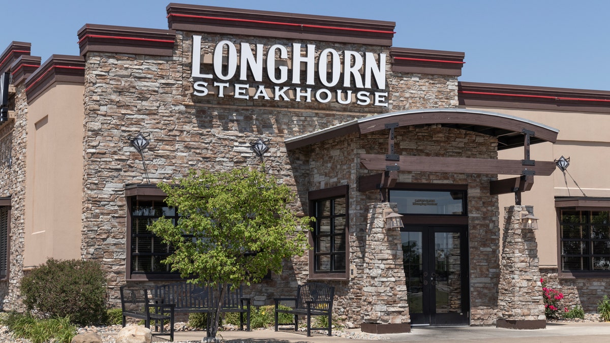 The exterior of a LongHorn Steakhouse is shown in the daytime.