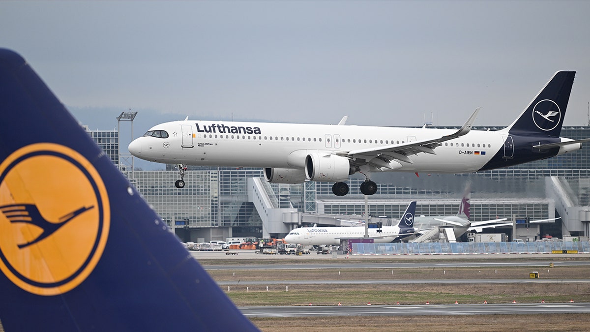 A Lufthansa Airbus A321 landing on tarmac