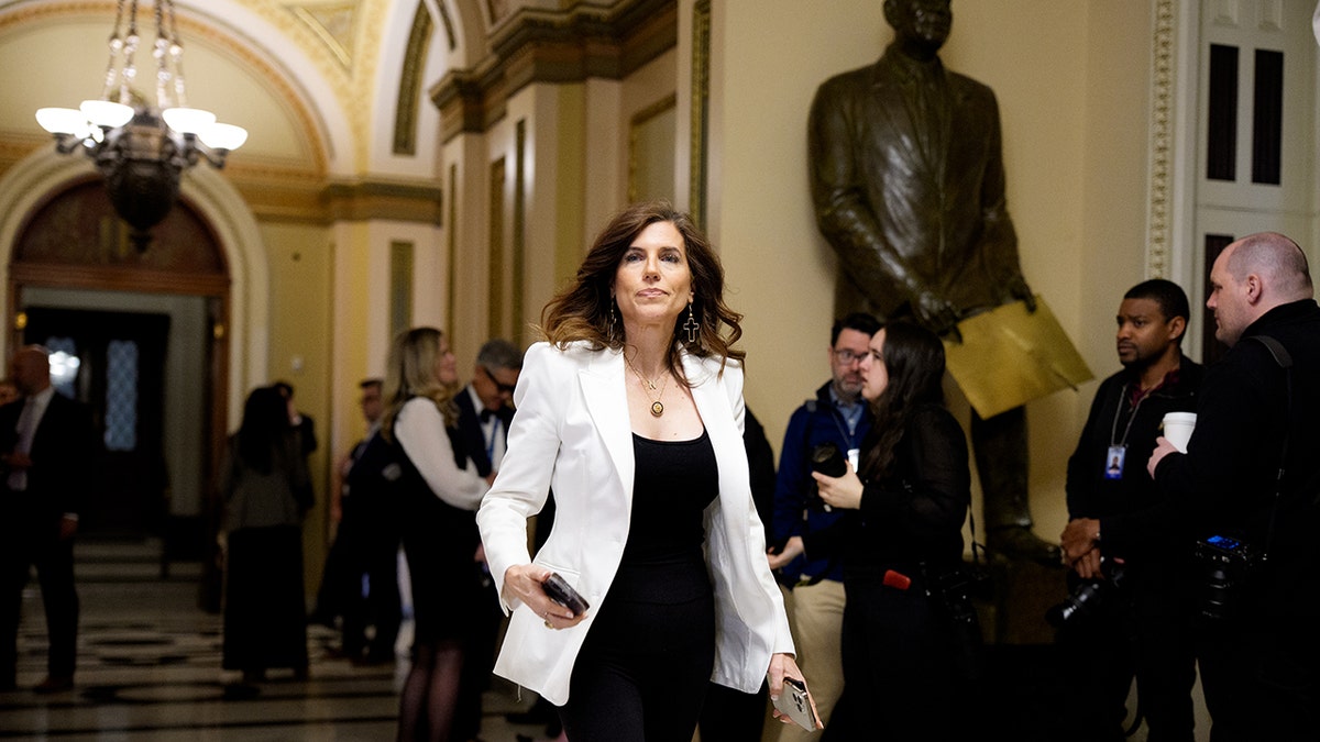 Mace walks through Capitol