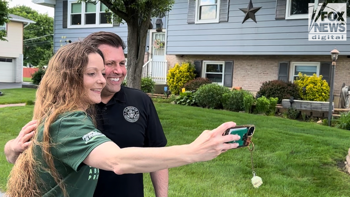 Mackenzie takes a selfie with an AFP activist as they knock on doors in the Lehigh Valley.