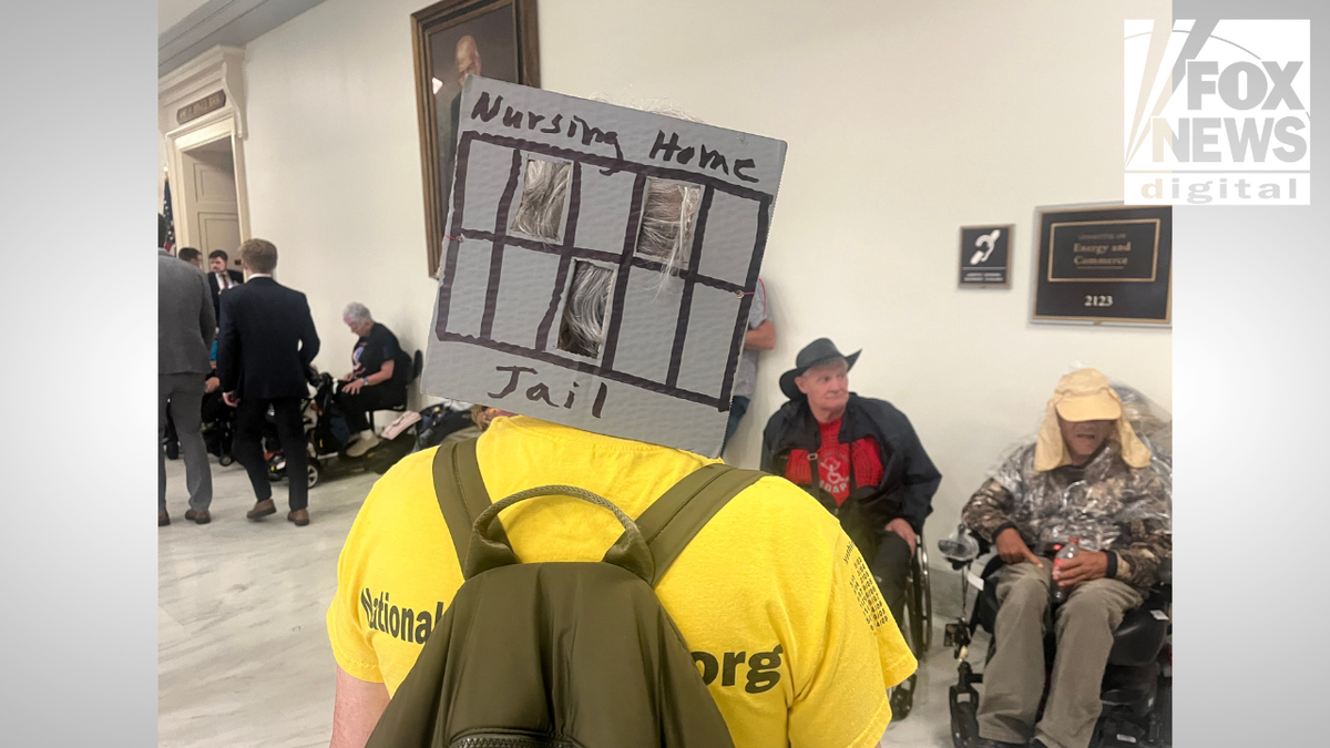 closeup of protester from down astatine Capitol Hill protestation connected May 13, 2025