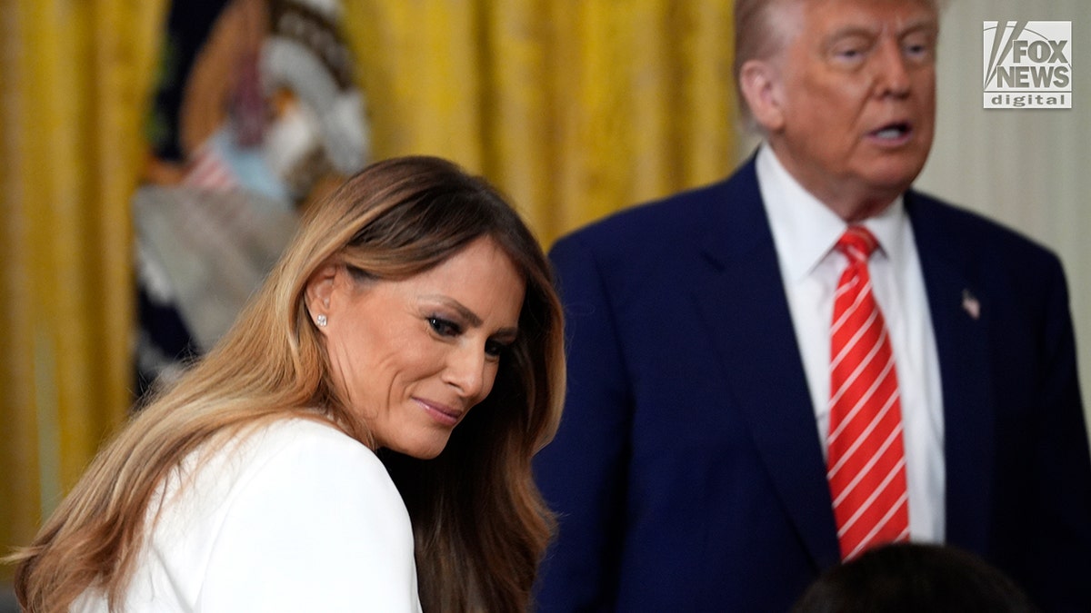 President Trump and wife, Melania Trump arrive to an event for military moms at the White House