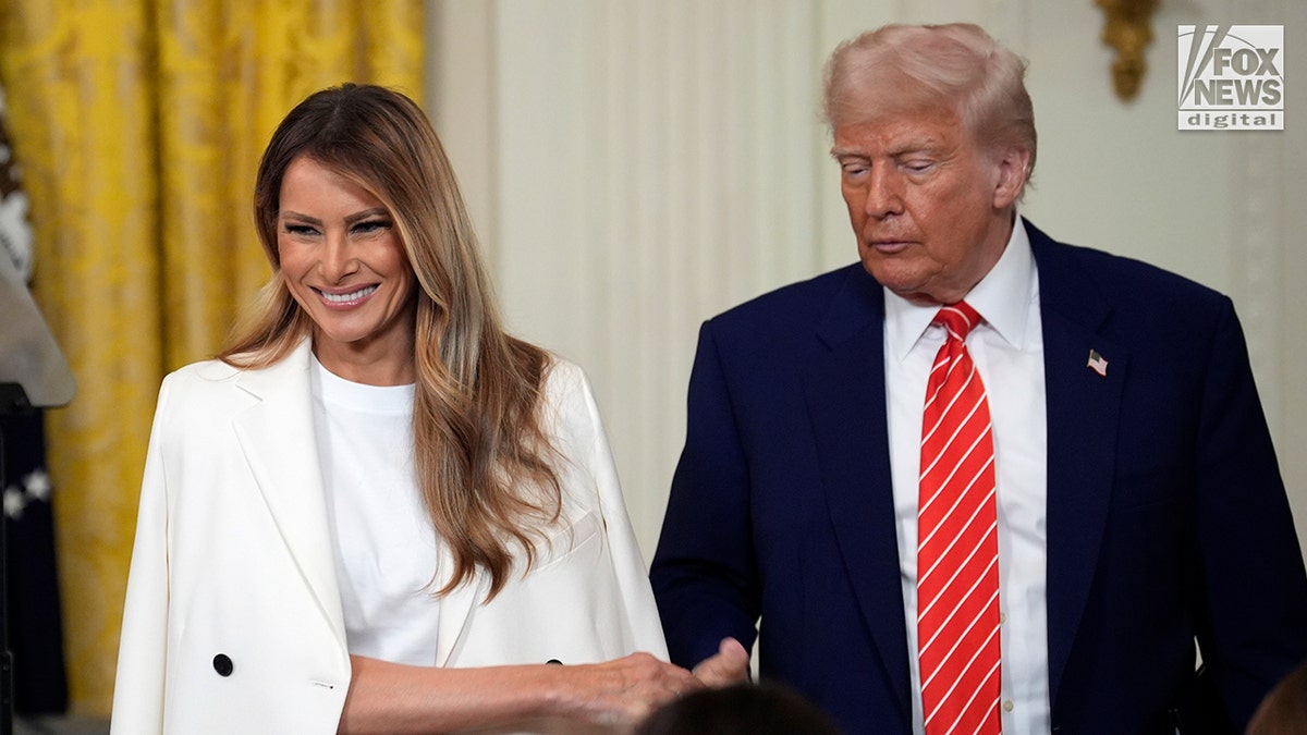 President Trump and wife, Melania Trump arrive to an event for military moms at the White House