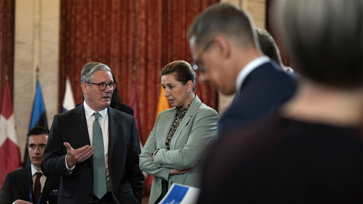Britain's Prime Minister Keir Starmer talks to Danish Prime Minister Mette Frederiksen