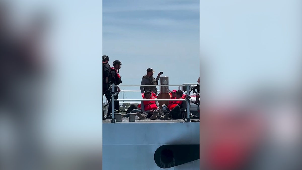 Illegal aliens being removed by the Coast Gaurd.