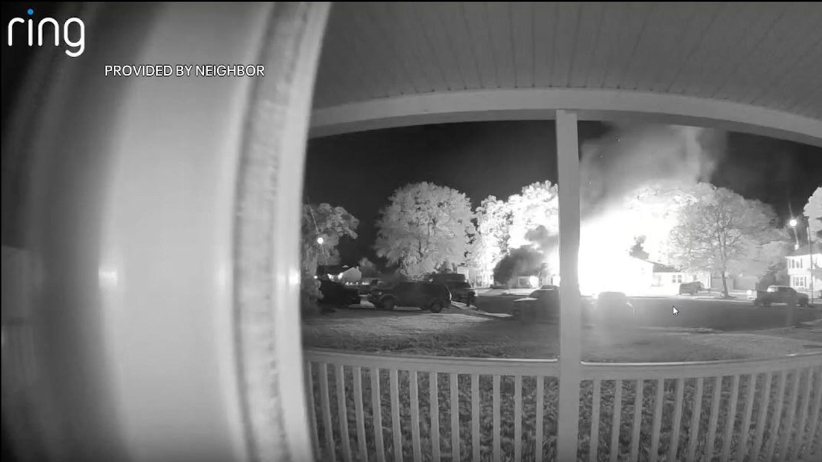 screenshot of ring door camera capturing moment house becomes engulfed in flames.