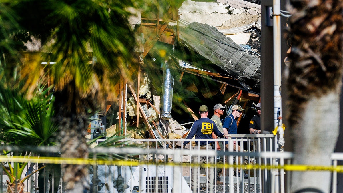 FBI inspecting the damage at the fertility clinic following the attack