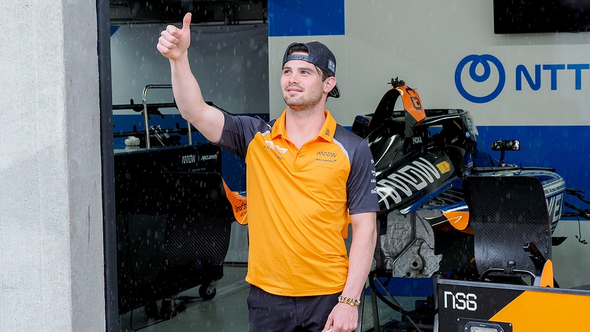 Pato O'Ward thumbs up to crowd