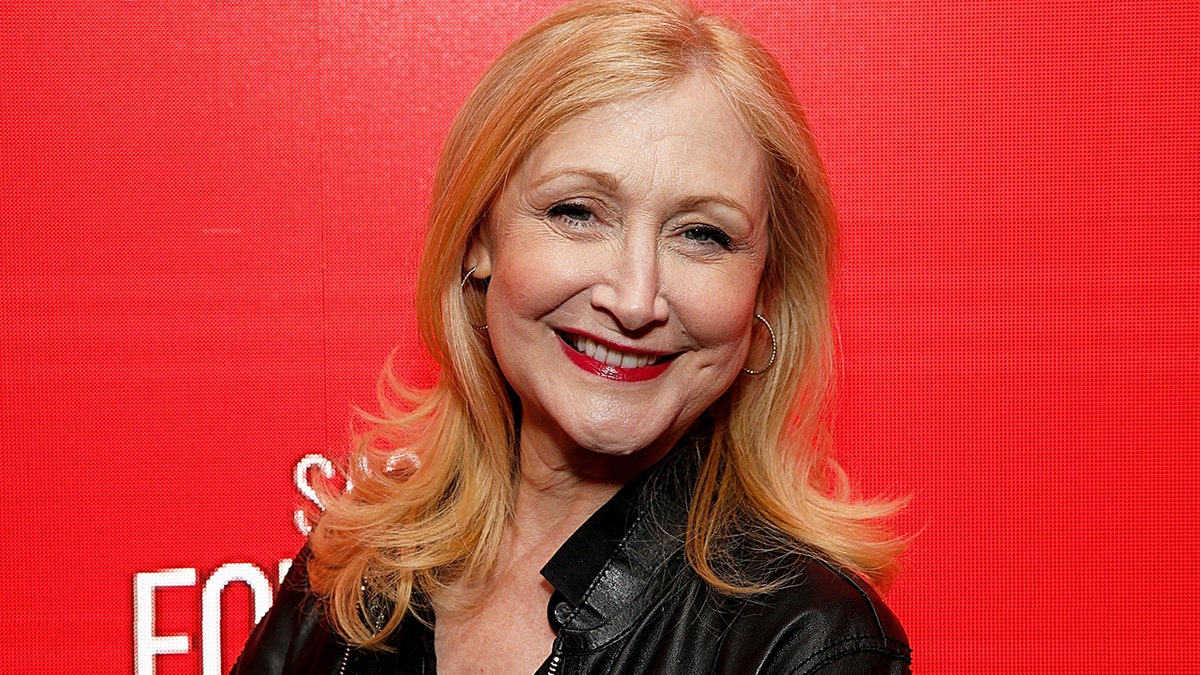 Patricia Clarkson smiling on red carpet