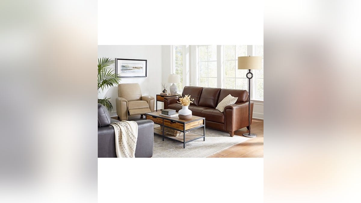A supportive leather couch that fits three.