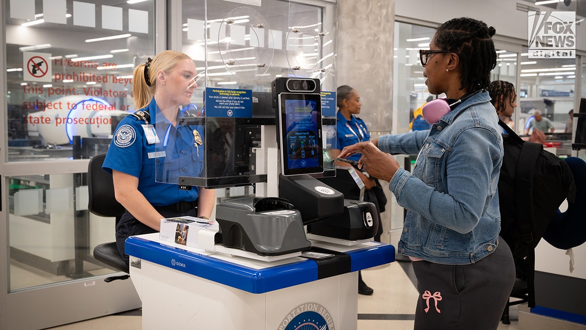 Young travelers present REAL ID's at the airport on day one of the program being in effect