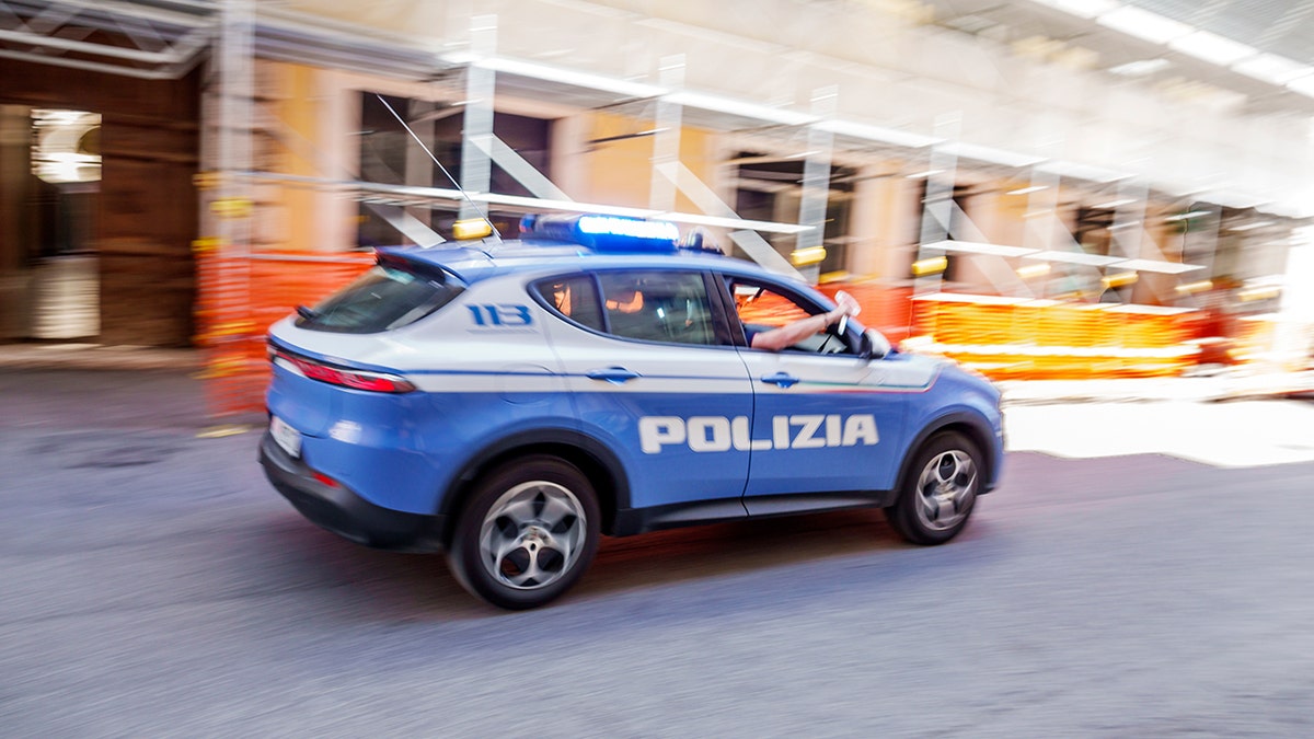 Rome, Italy, Via del Tritone, polizia, police car vehicle, moving speeding, motion blurred action