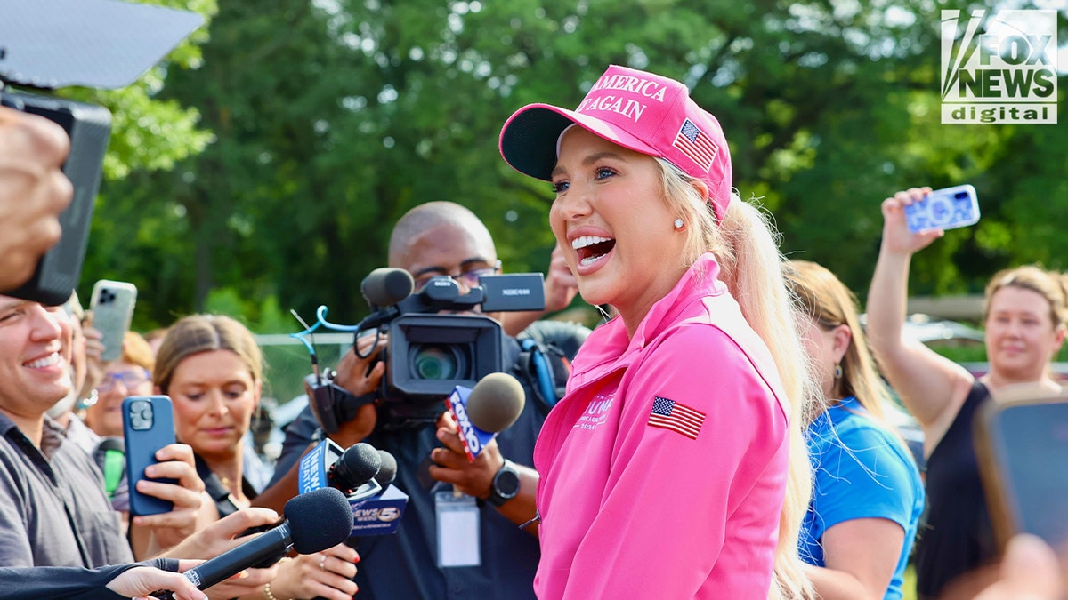 Savannah Chrisley addresses the media outside the prison where Chris Chrisley was being held before being pardoned by President Trump