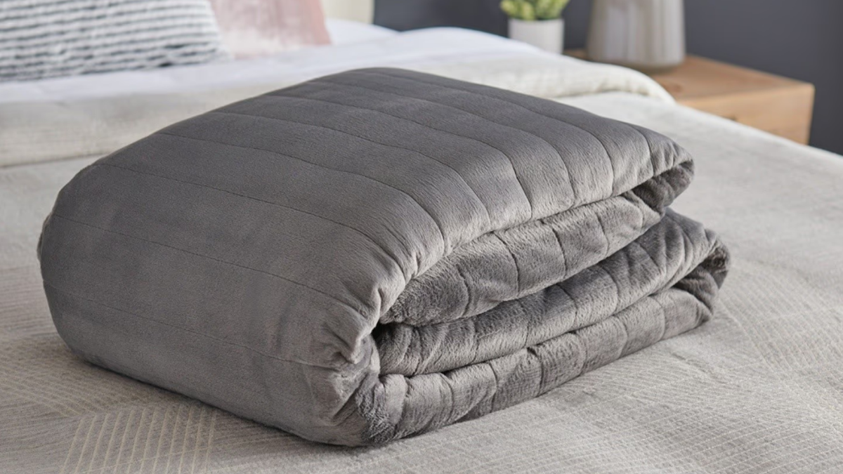 The Tempur-Pedic blanket is filled with glass beads.