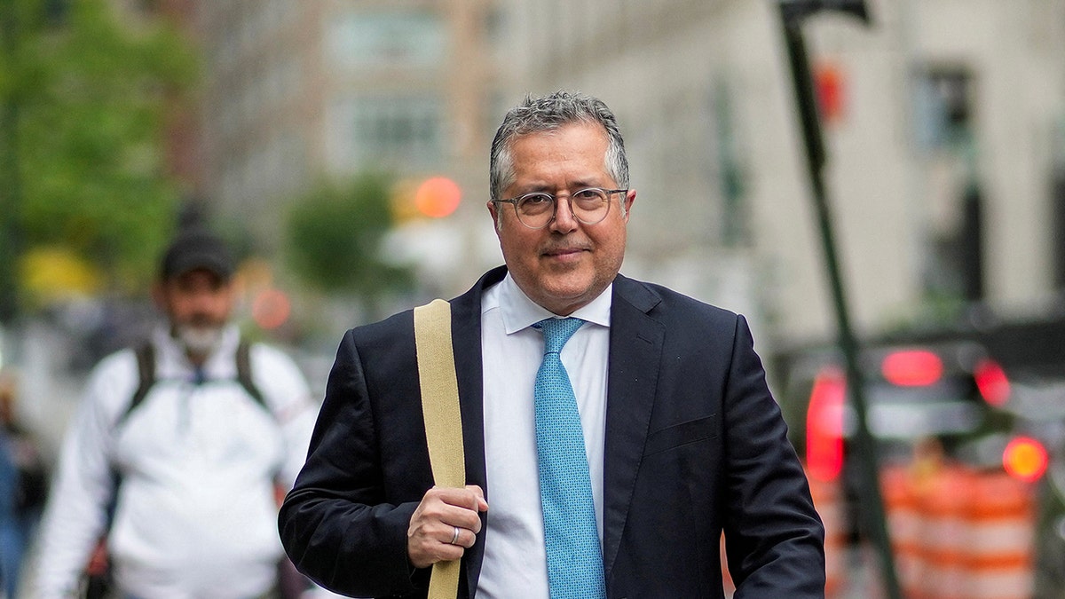 P. Diddy's lawyer arrives to court for his trial.