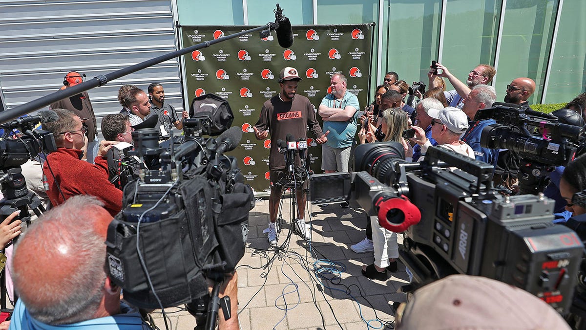 Sheder Sanders talks to the media