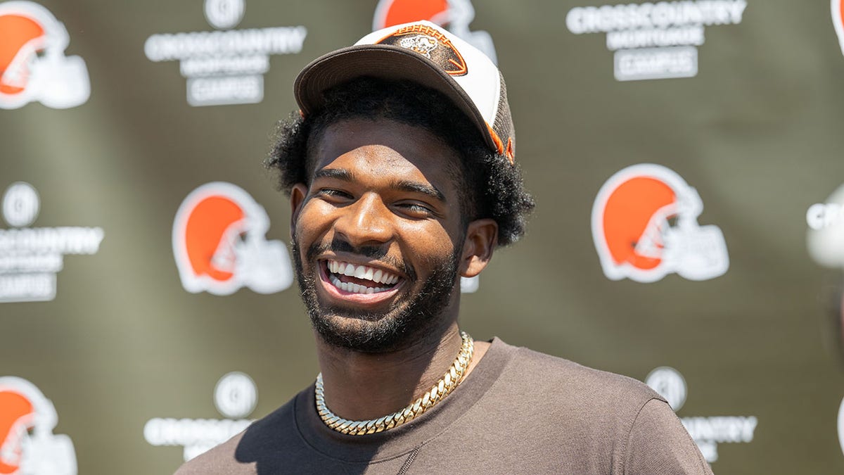 Sheder Sanders smiles
