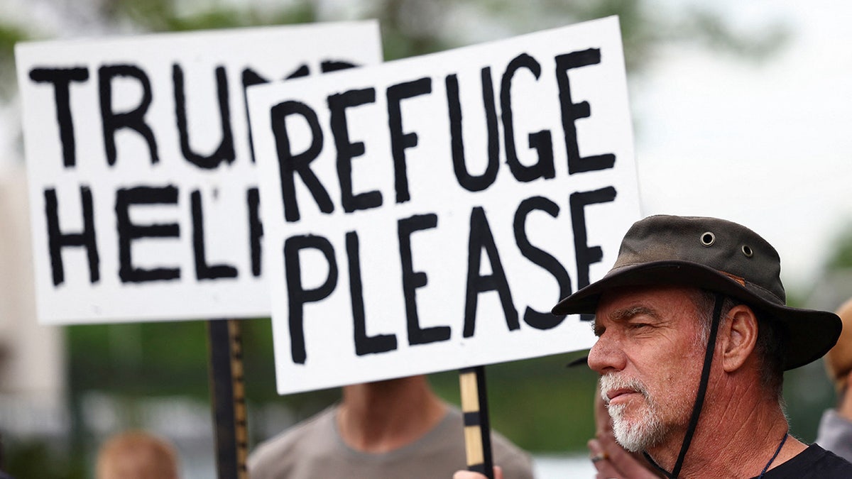 Afrikaner protesting to go a refugee