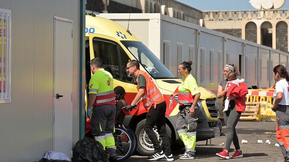 Aid workers rescuing migrants