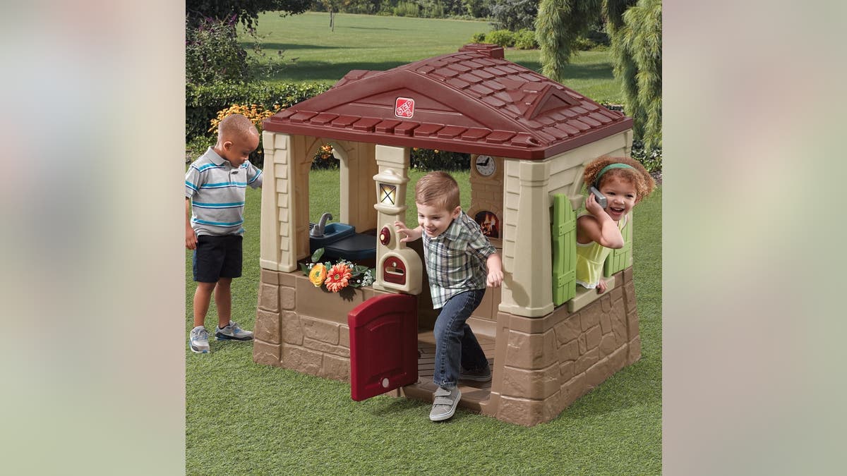 The Step2 Neat & Tidy Cottage II Brown Playhouse is a durable, plastic playhouse.