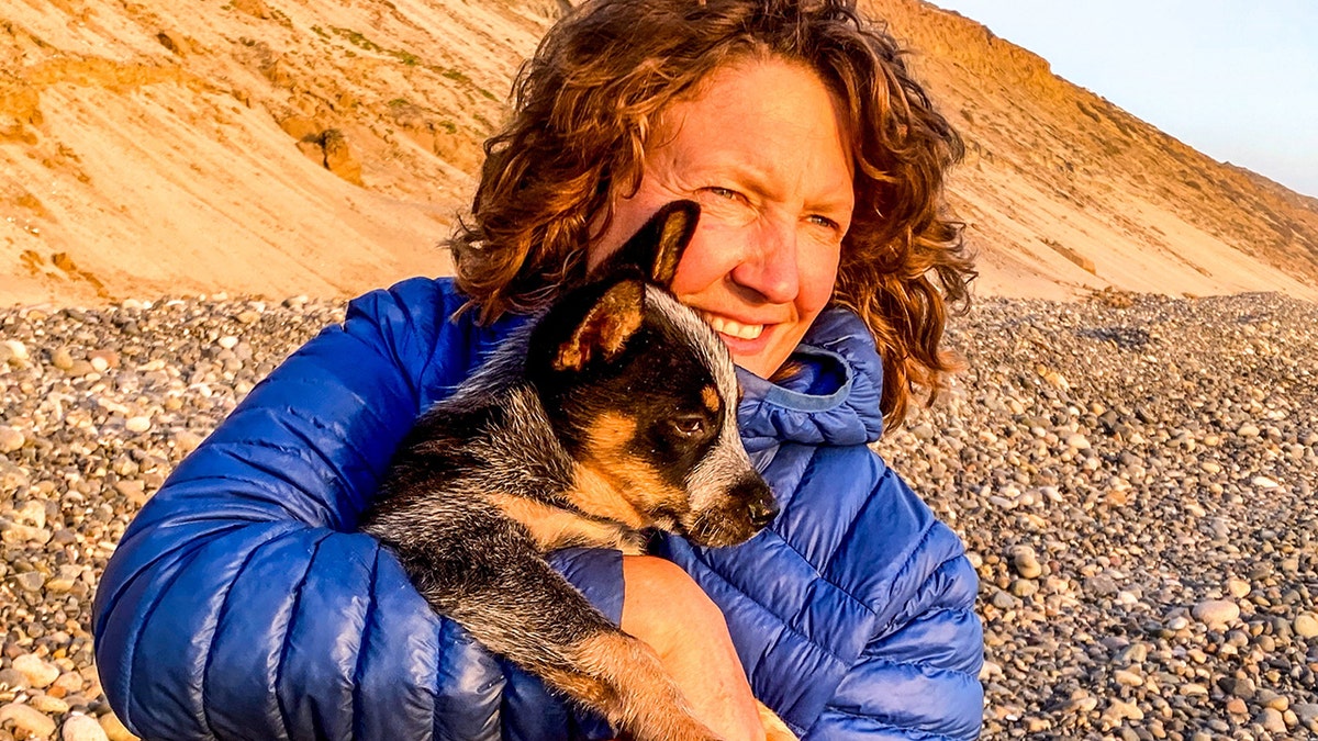 Flea-ridden puppy becomes world traveler with adventurer who had feared dogs all her life Heike Pirngruber from Heidelberg, Germany, has taken Butch the Australian Cattle puppy, under her wing and the pair have crossed multiple countries together, on foot, by canoe, motorcycle, and even by Tuk Tuk. A woman who ‘never liked dogs’ is now walking around the world with a puppy - that she found neglected and full of fleas. Heike Pirngruber, 53, has turned Australian Cattle puppy Butch into one of the best travelled dogs on the planet - vising dozens of countries. She adopted him in 2021 when he was just one month old while she was renting a beach hut in Baja California, Mexico, despite not liking dogs after being chased by them while cycling around the world for seven years.