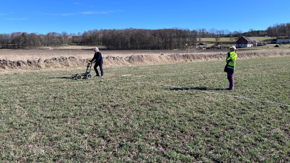 Archaeologist working in field