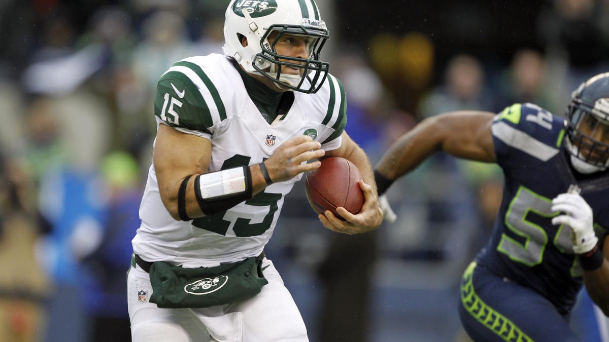 Tim Tebow rushing