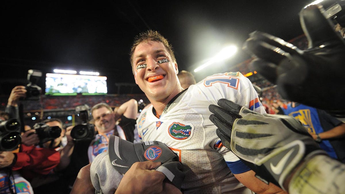 Tim Tebow celebrates