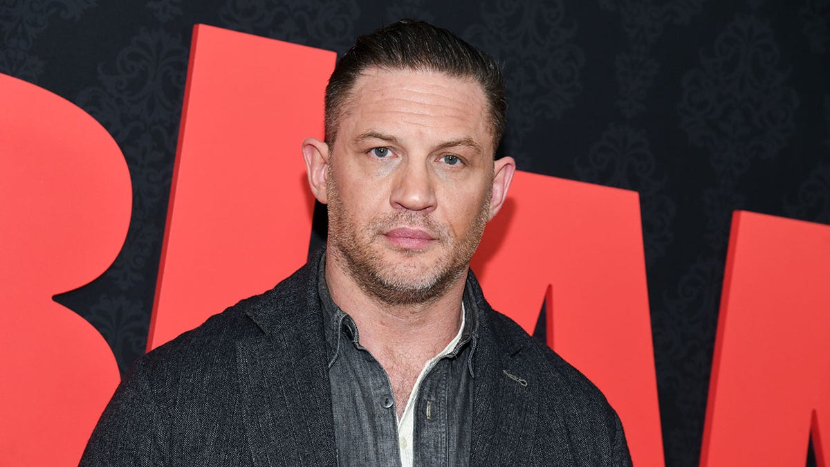 Tom Hardy poses