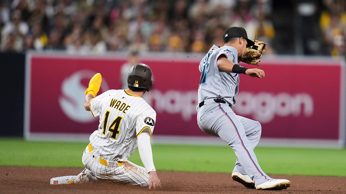 Tyler Wade slides in safely
