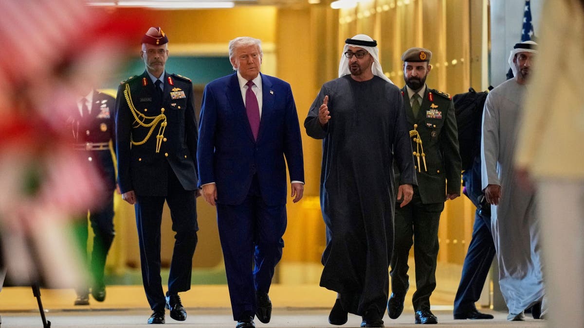 United Arab Emirates President Sheikh Mohammed bin Zayed Al Nahyan greets President Donald Trump at Abu Dhabi International Airport on Thursday, May 15, 2025.