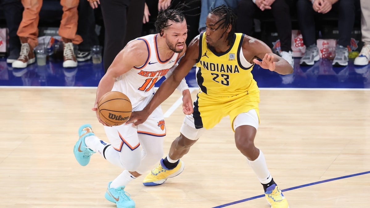 New York Knicks guard Jalen Brunson (11) controls the ball against Indiana Pacers forward Aaron Nesmith (23) in the fourth quarter during game two of the eastern conference finals for the 2025 NBA Playoffs at Madison Square Garden.