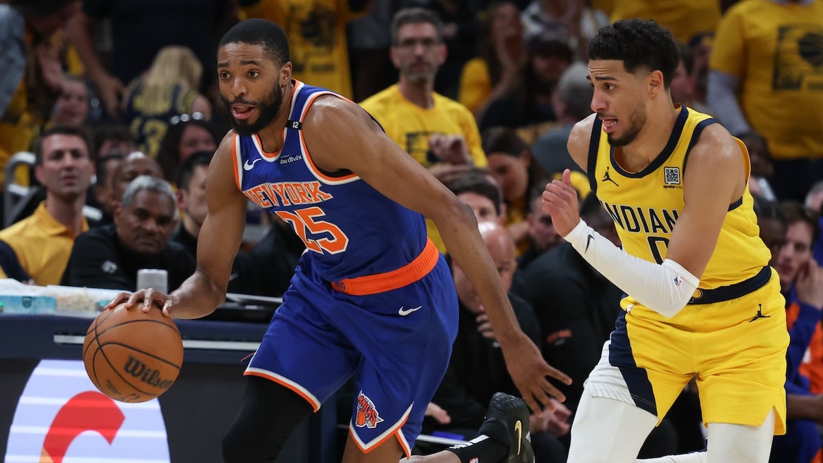 New York Knicks Forward Mikal Bridges (25) was hit in the third quarter in the Eastern Conference Finals of the 2025 NBA Playoffs at Gainbridge Fieldhouse.