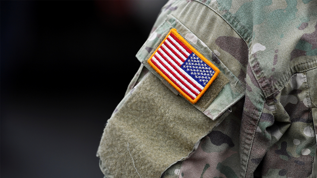 U.S. emblem is pictured connected nan limb of a soldier