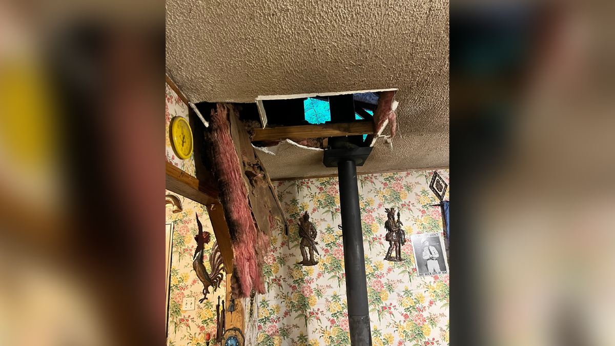 Hole in ceiling of Kentucky home