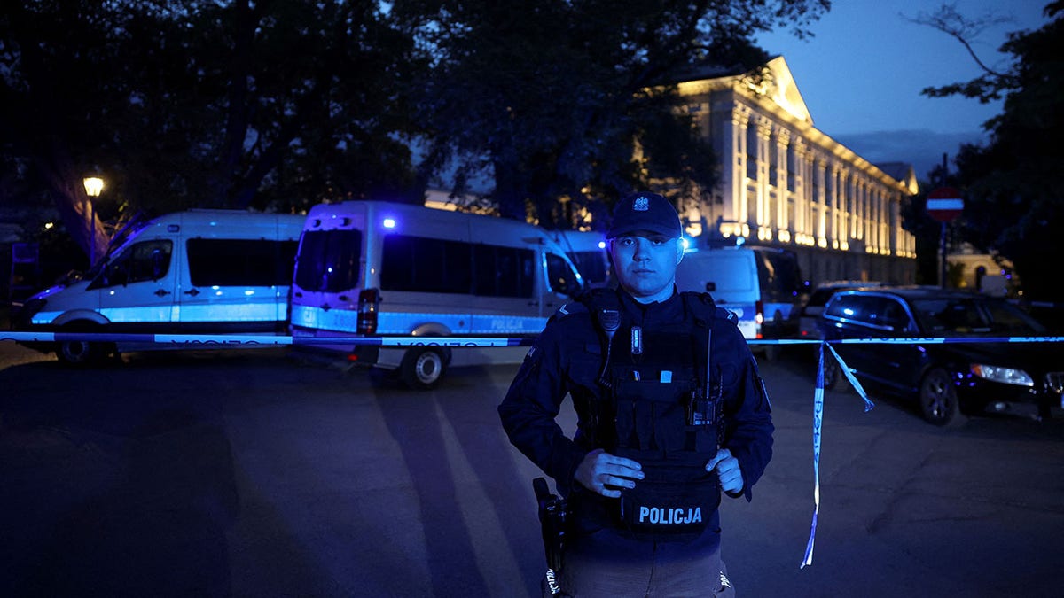 Warsaw police at the site of an attack